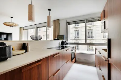Cuisine ou kitchenette dans l'établissement Pick A Flat's Apartments in Tour Eiffel - Rue de l'Amiral Hamelin