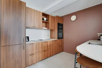 Cuisine ou kitchenette dans l'établissement Pick A Flat's Apartments in Tour Eiffel - Rue de l'Amiral Hamelin