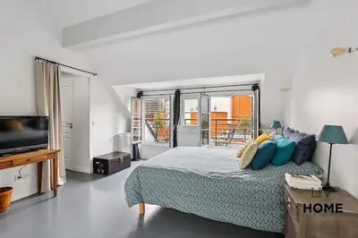 Un ou plusieurs lits dans un hébergement de l'établissement Triplex Atypique à 10mn de Paris