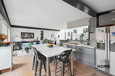 Cuisine ou kitchenette dans l'établissement Triplex Atypique à 10mn de Paris