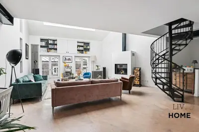 Coin salon dans l'établissement Triplex Atypique à 10mn de Paris
