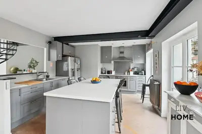 Cuisine ou kitchenette dans l'établissement Triplex Atypique à 10mn de Paris