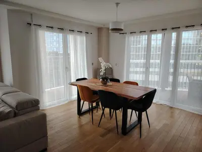 Coin salon dans l'établissement Grand appartement familial paris13