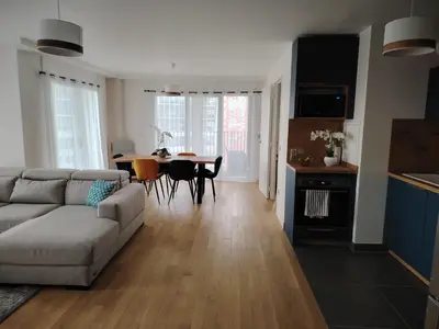 Coin salon dans l'établissement Grand appartement familial paris13
