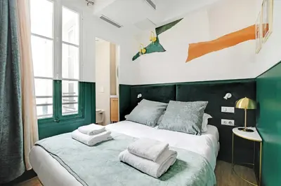 Un ou plusieurs lits dans un hébergement de l'établissement Modern Studio with A-C - Near Montmartre