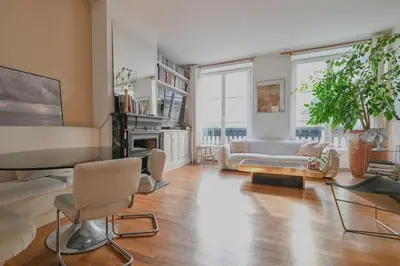 Coin salon dans l'établissement Spacious apartment in central Paris