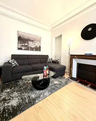 Coin salon dans l'établissement Champs Élysées appartement 5