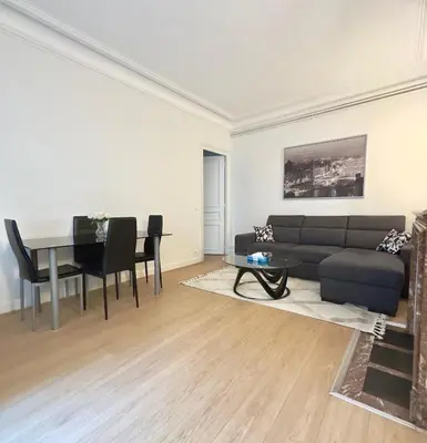Coin salon dans l'établissement Champs Élysées appartement 5