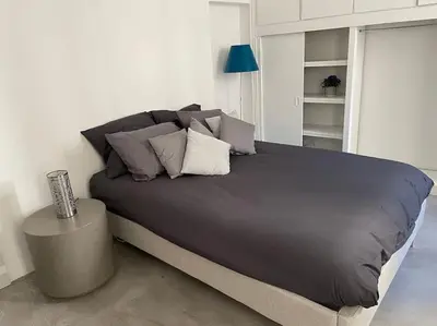 Un ou plusieurs lits dans un hébergement de l'établissement Au cœur du Marais, un joli studio !