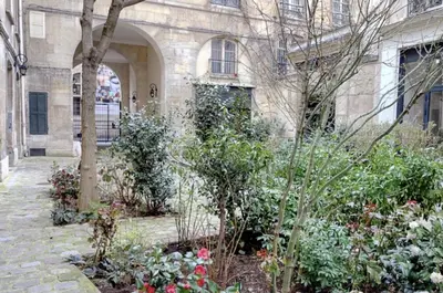 Jardin de l'établissement Au cœur du Marais, un joli studio !