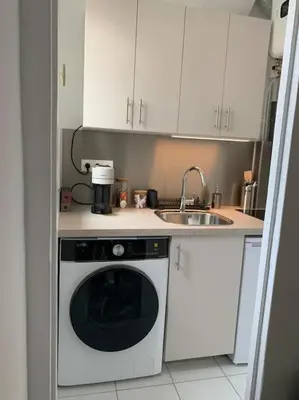 Cuisine ou kitchenette dans l'établissement Charmant 2 pièces rénové parc des expositions porte de Versailles