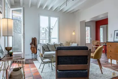 Coin salon dans l'établissement Montmartre, Patio! Sacré-Coeur! Stylish duplex!
