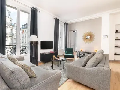 Coin salon dans l'établissement LivinParis - Luxury 3 Bedrooms Le Louvre I