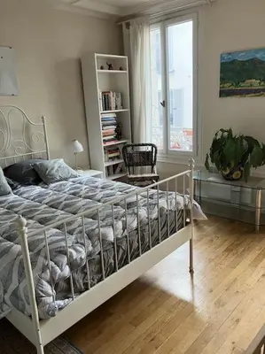 Un ou plusieurs lits dans un hébergement de l'établissement Grand Appartment 