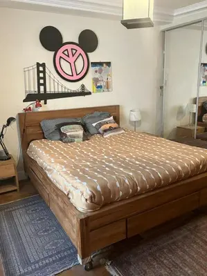Un ou plusieurs lits dans un hébergement de l'établissement Grand Appartment 