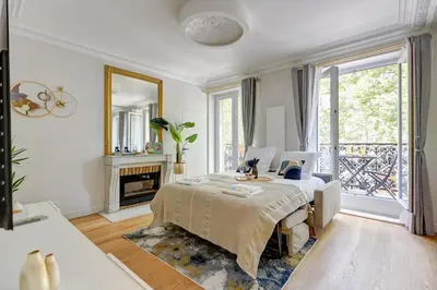 Un ou plusieurs lits dans un hébergement de l'établissement 1er Arrondissement Paris Luxueuse Suite