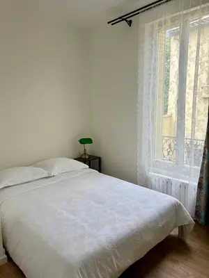 Un ou plusieurs lits dans un hébergement de l'établissement Appartement en duplex - M4 et RER B Arcueil-Cachan