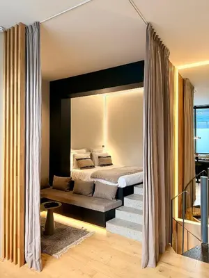 Un ou plusieurs lits dans un hébergement de l'établissement Luxury Suite 2BR Le Marais AC Courtyard