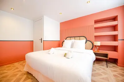 Un ou plusieurs lits dans un hébergement de l'établissement Cosy flats- NOTRE DAME