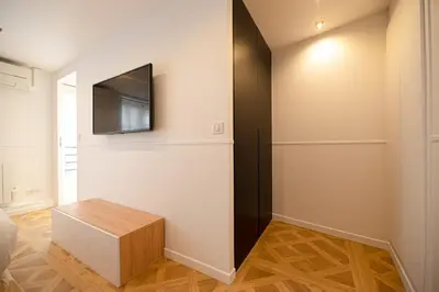 Télévision ou salle de divertissement dans l'établissement Cosy flats- NOTRE DAME