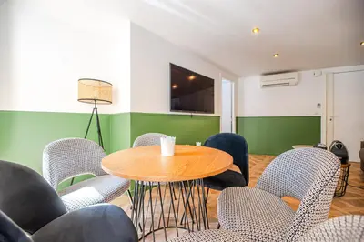 Coin salon dans l'établissement Cosy flats- NOTRE DAME