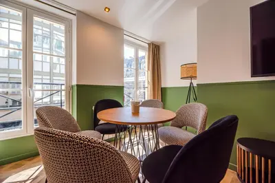 Coin salon dans l'établissement Cosy flats- NOTRE DAME