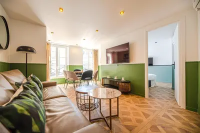 Coin salon dans l'établissement Cosy flats- NOTRE DAME