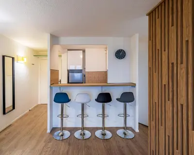 Cuisine ou kitchenette dans l'établissement Serenity Aparthotel, la Défense - Eiffel tower view - 5 min walk to Subway