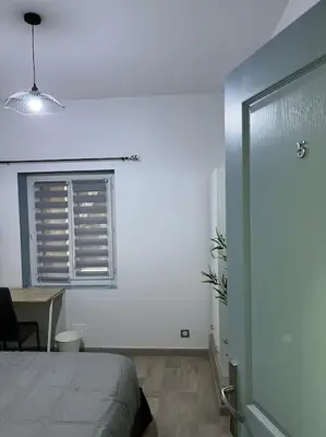 Un ou plusieurs lits dans un hébergement de l'établissement BX - Maison 10 rooms - 12 beds - metro PARIS EXPO