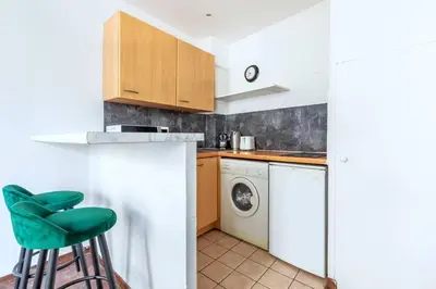 Cuisine ou kitchenette dans l'établissement Studio intimiste au cœur du Marais historique