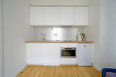 Cuisine ou kitchenette dans l'établissement Grand Studio 2 pers République Bastille Paris 3