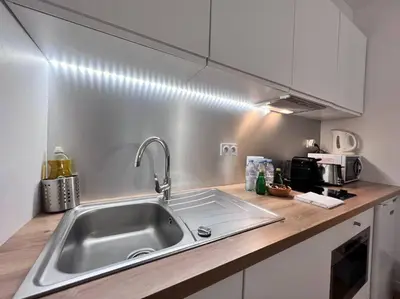 Cuisine ou kitchenette dans l'établissement Grand Studio 2 pers République Bastille Paris 3