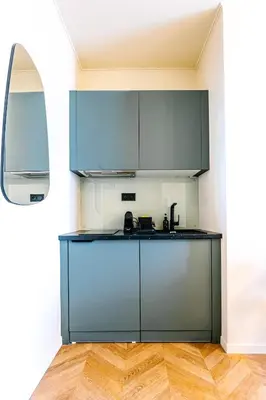 Cuisine ou kitchenette dans l'établissement Studio Design Neuf - Central