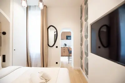 Un ou plusieurs lits dans un hébergement de l'établissement Lovely & Romantic Suite near Bastille