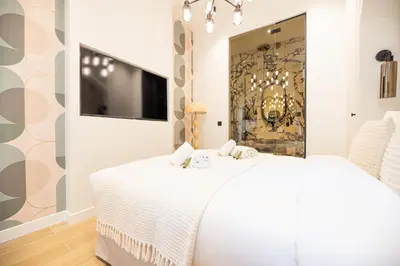 Un ou plusieurs lits dans un hébergement de l'établissement Lovely & Romantic Suite near Bastille