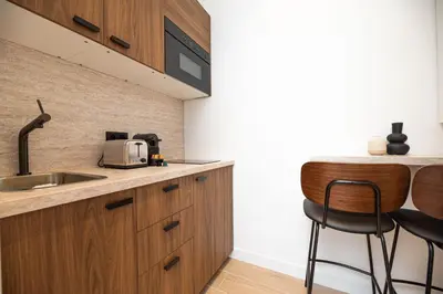 Cuisine ou kitchenette dans l'établissement Lovely & Romantic Suite near Bastille