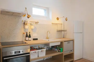 Cuisine ou kitchenette dans l'établissement T3 cosy aux portes de Paris