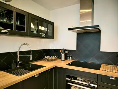 Cuisine ou kitchenette dans l'établissement Montmartre en rez-de-jardin