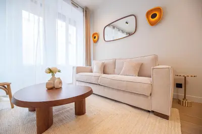 Coin salon dans l'établissement Apartment in montmartre