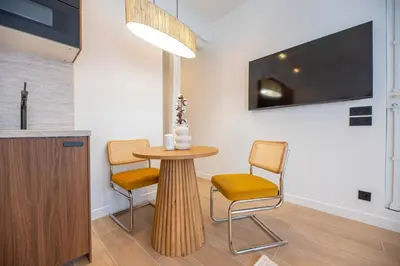 Télévision ou salle de divertissement dans l'établissement Apartment in montmartre