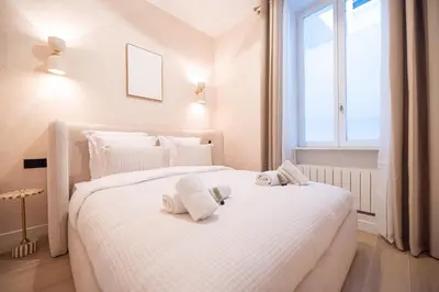 Un ou plusieurs lits dans un hébergement de l'établissement Apartment in montmartre