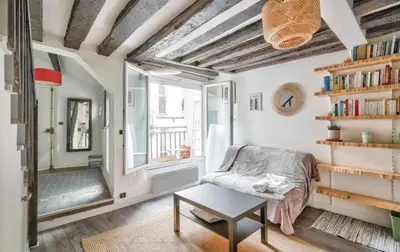 Coin salon dans l'établissement GuestReady - Bright Stay in the Heart of Paris