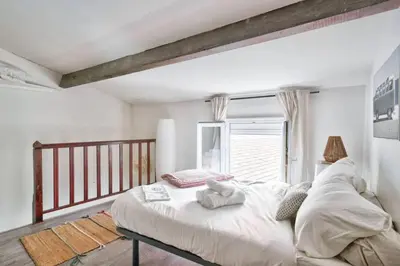 Un ou plusieurs lits dans un hébergement de l'établissement GuestReady - Bright Stay in the Heart of Paris