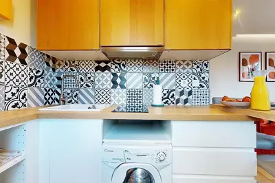 Cuisine ou kitchenette dans l'établissement F2 Trocadero