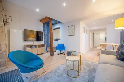 Coin salon dans l'établissement Beautiful Apartment in Saint Germain
