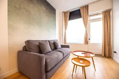 Coin salon dans l'établissement Beautiful Apartment in saint germain des prés
