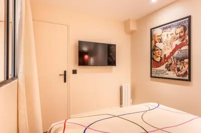 Un ou plusieurs lits dans un hébergement de l'établissement Maison Menilmontant