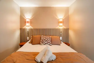 Un ou plusieurs lits dans un hébergement de l'établissement Merveilleux appartement de luxe au coeurs de Saint-Germain