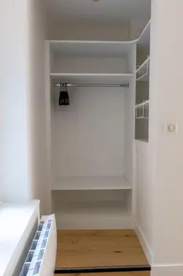 Un ou plusieurs lits dans un hébergement de l'établissement Appartement contemporain rénové à Paris 14ème