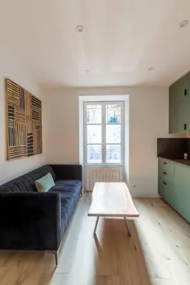 Coin salon dans l'établissement Appartement contemporain rénové à Paris 14ème